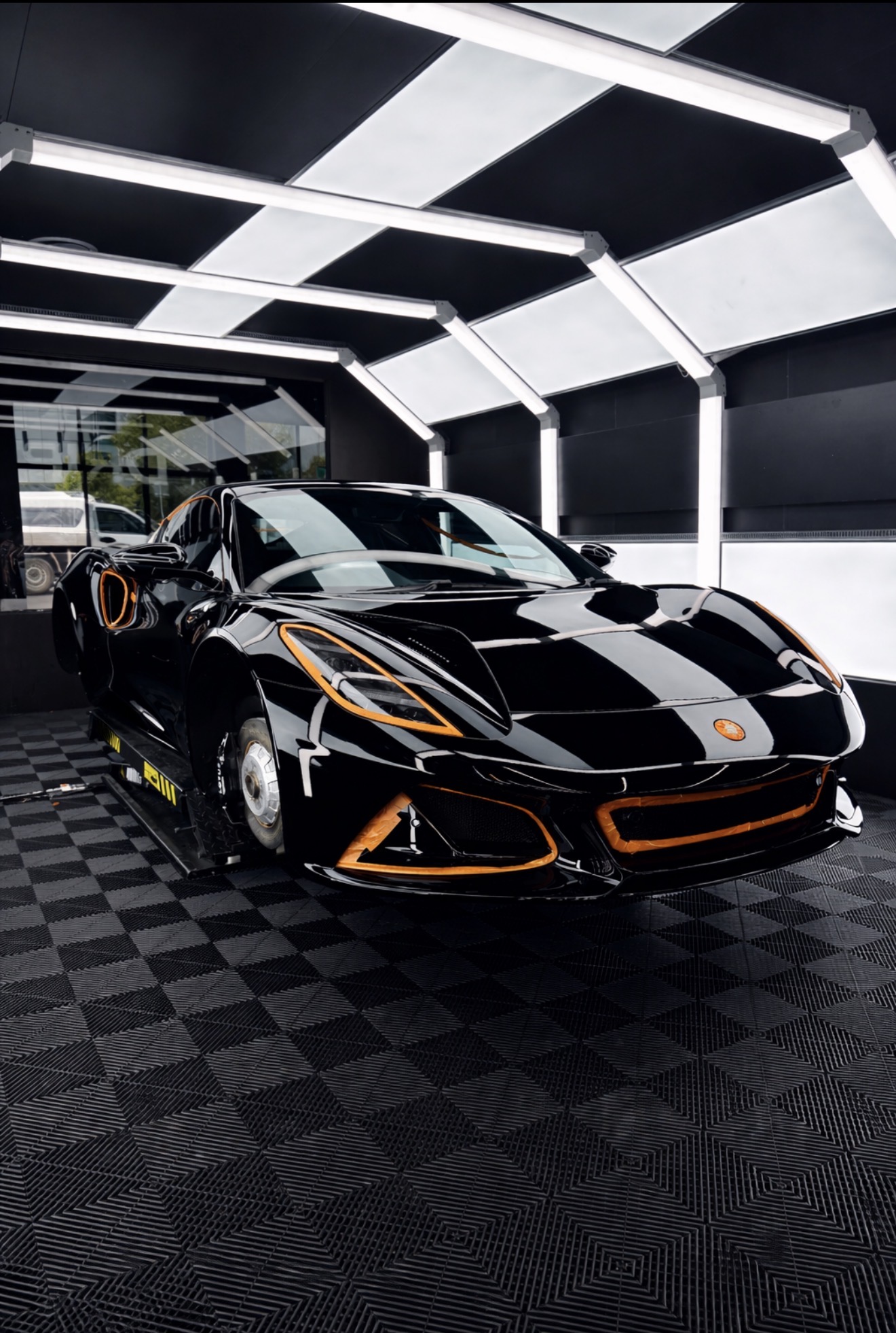 Ceramic coating Townsville — Lotus Emira gloss black nano-ceramic protection