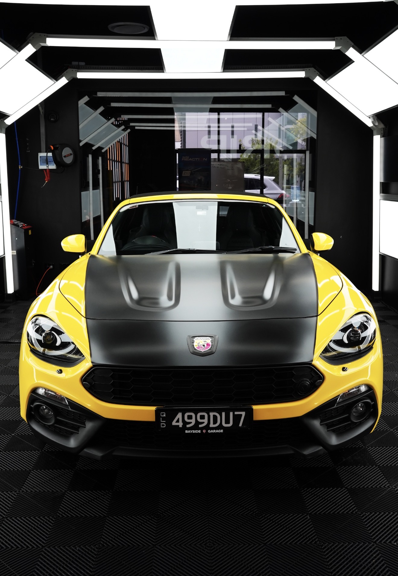 Vinyl wrap Townsville — Abarth 124 Spider yellow with matte black hood wrap