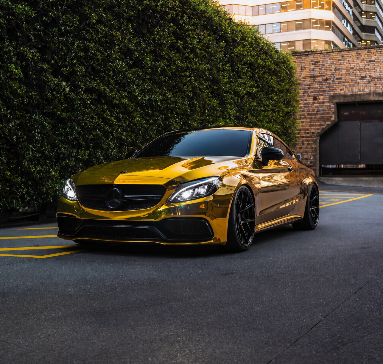 Vinyl wrap Townsville — Mercedes-AMG C63 gold chrome full-body wrap