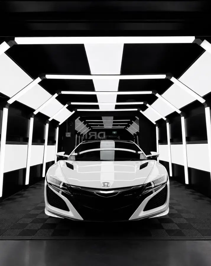 White NSX-style sports car with ceramic gloss finish at DRIP Automotive Co Southport studio